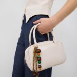 Tima Creme + Charm